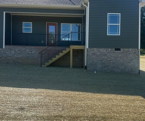 Rear entrance and covered porch of Liberty Road home built by Grantham Builders